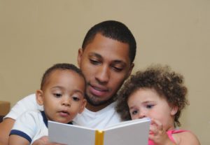 Dad telling a story to kids