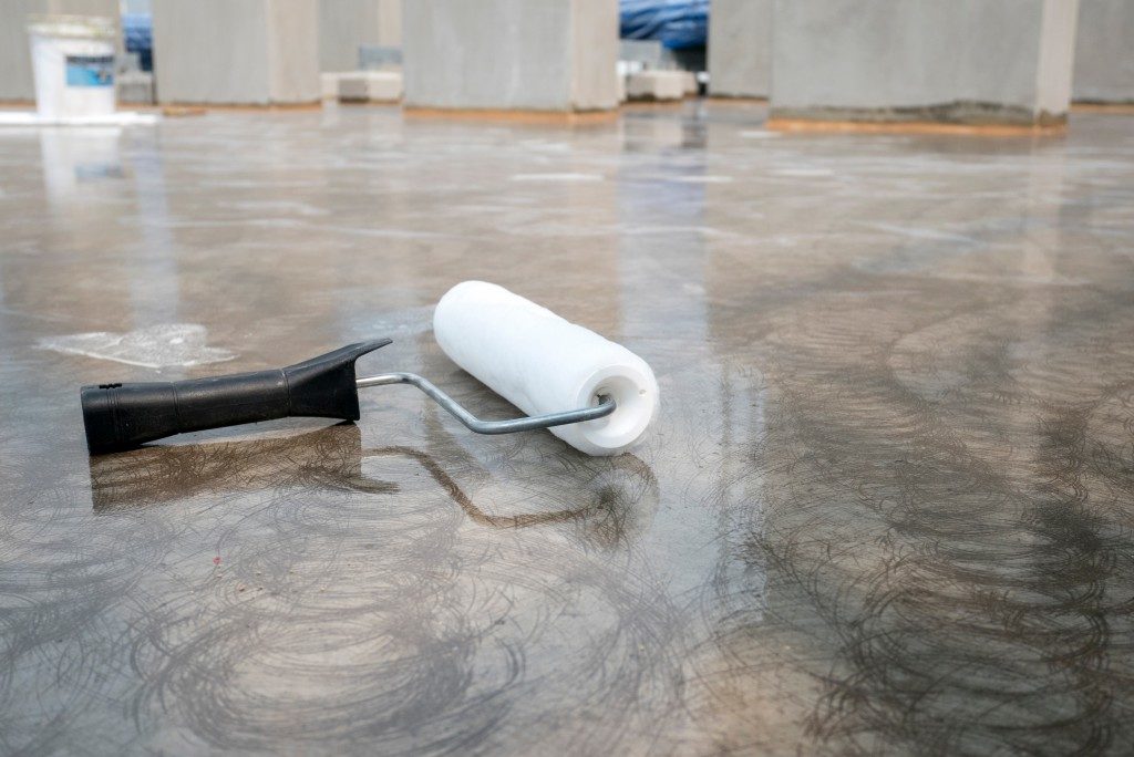 Water resistant coating concrete flooring