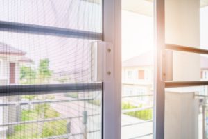 Insect screen on door slide