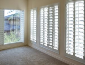 empty room with shutter windows