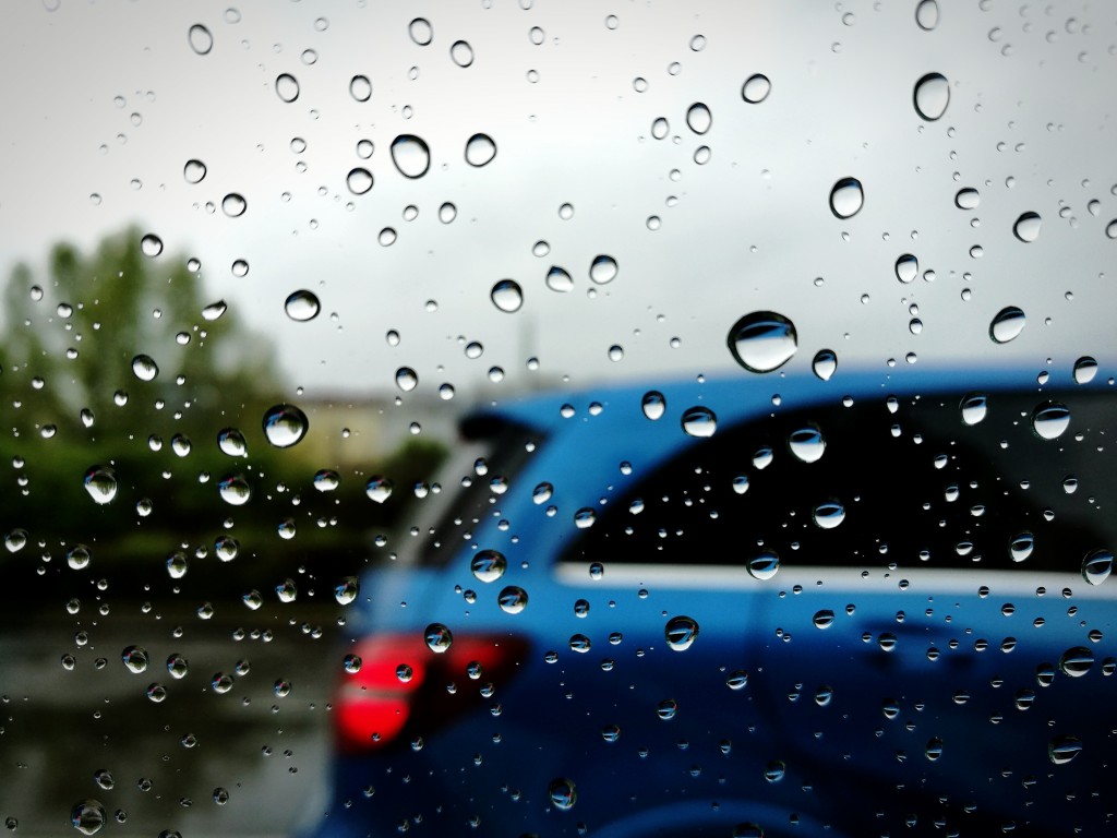 raining blue car