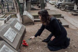 woman at a cemetery