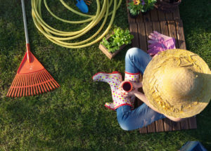 gardener cleaning lawn