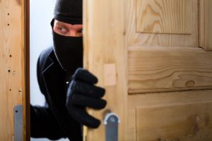 thief entering a house